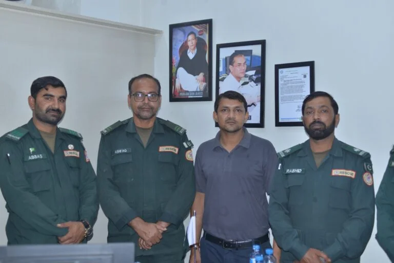 YMC colleagues with rescue professionals